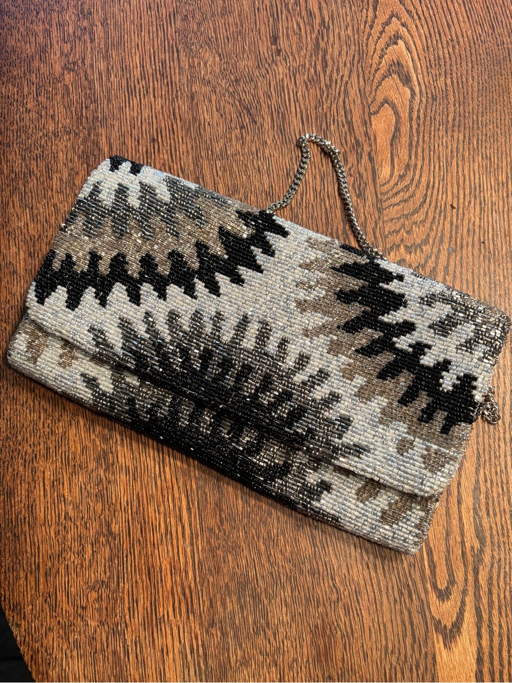 Vintage clutch bag with chain embellishments